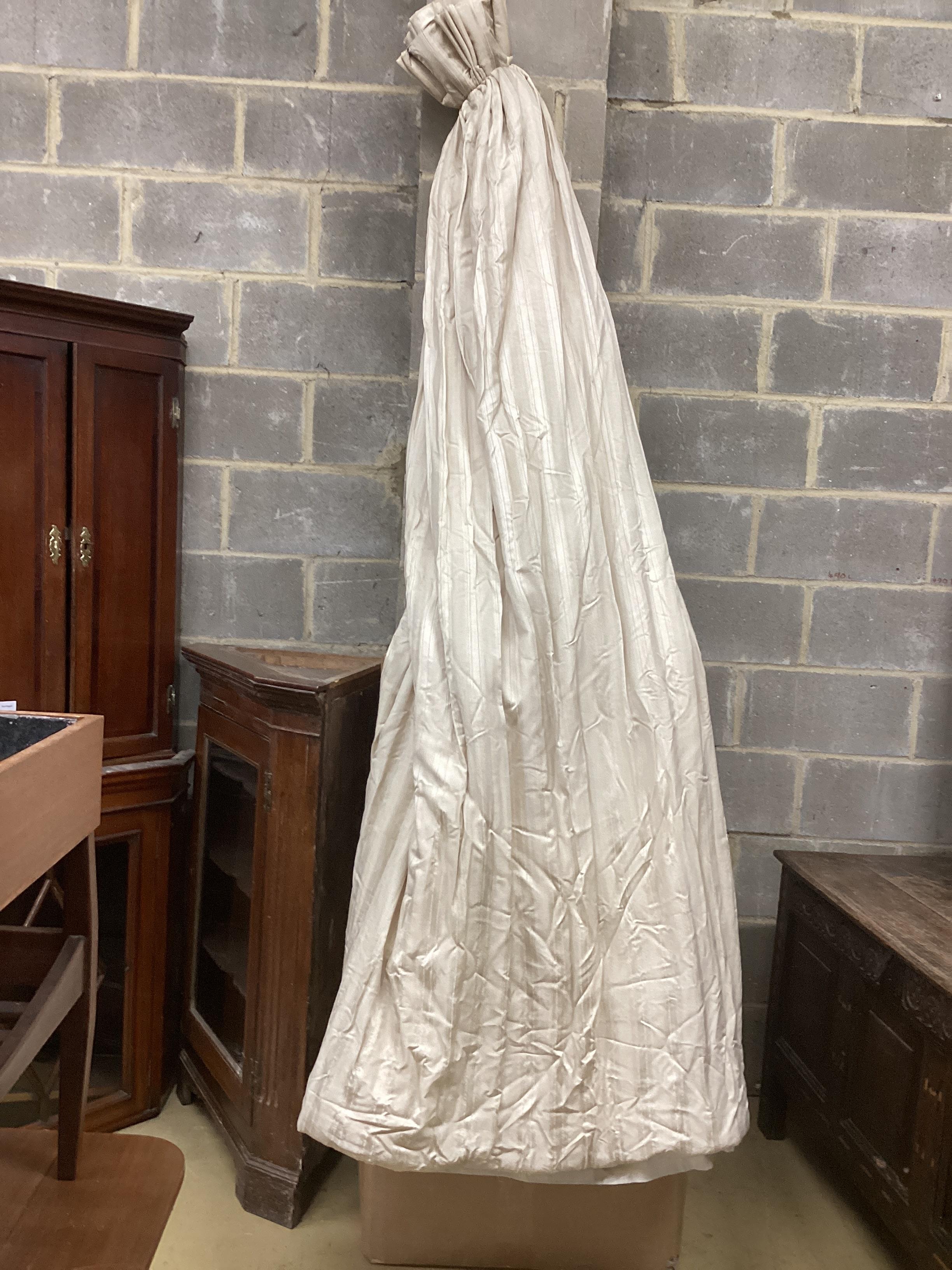 A set of four gold striped lined curtains approximate widths 170cm top, 360cm floor, 240cm drop with ten matching drapes and six tie backs